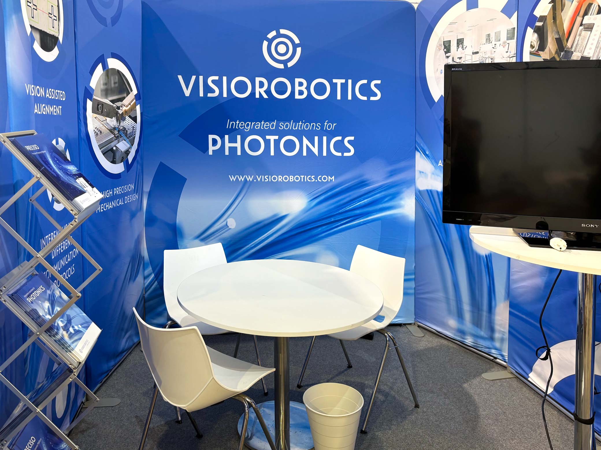 Visiorobotics booth at ECOC 2026 showcasing integrated solutions for photonics.